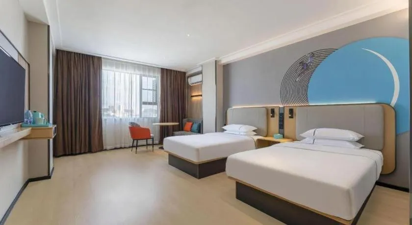 Bed in City Comfort Inn Yangjiang Yangxi Renmin Road Triumph Plaza