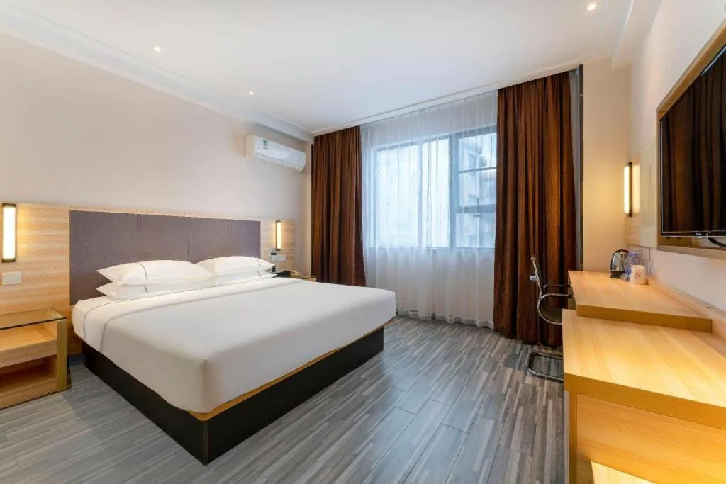 Bed in City Comfort Inn Yangjiang Yangxi Renmin Road Triumph Plaza