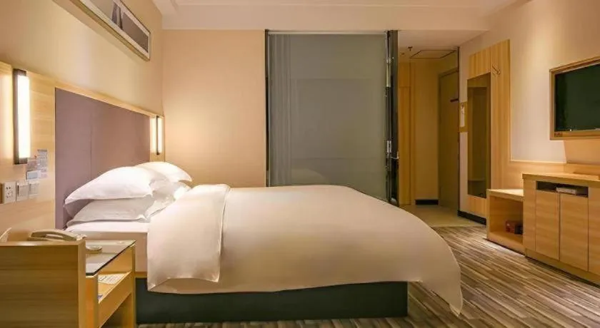 Bed in City Comfort Inn Yangjiang Yangxi Renmin Road Triumph Plaza