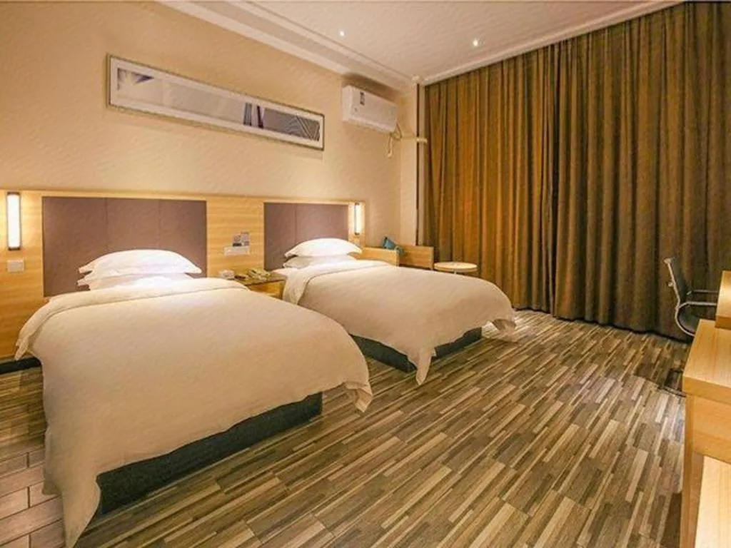 Bed in City Comfort Inn Yangjiang Yangxi Renmin Road Triumph Plaza