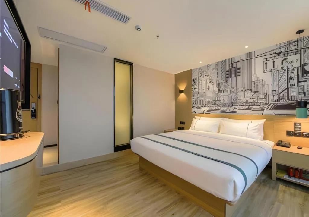 Bed in City Comfort Inn Shiyan High-speed Railway Wanda Plaza