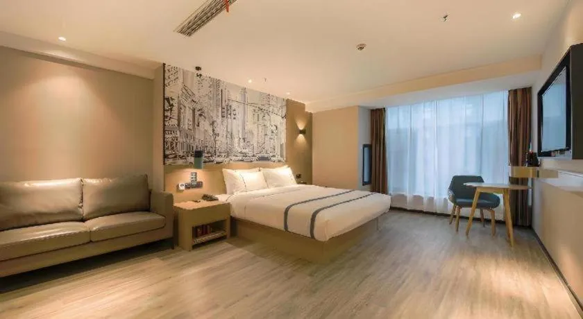 Bed in City Comfort Inn Shiyan High-speed Railway Wanda Plaza