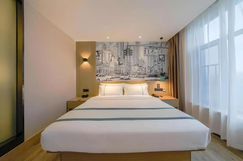 Bed in City Comfort Inn Shiyan High-speed Railway Wanda Plaza