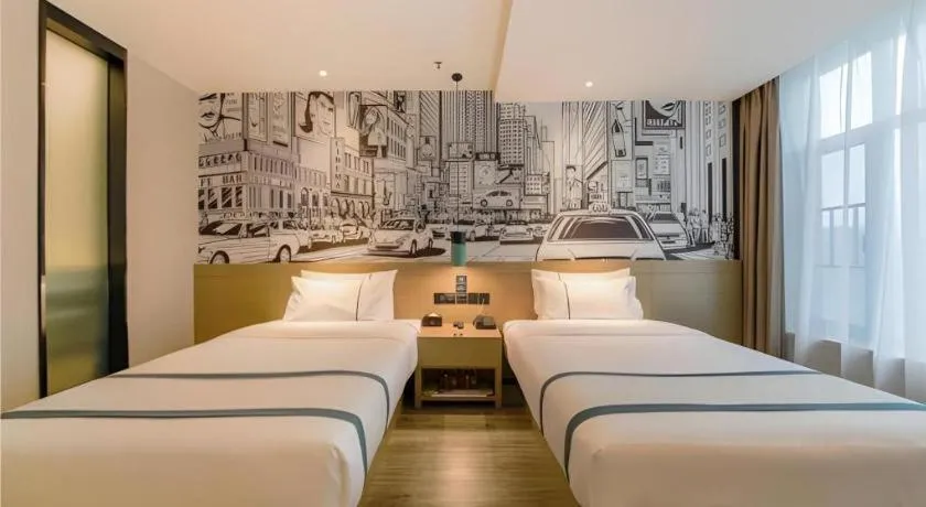 Bed in City Comfort Inn Shiyan High-speed Railway Wanda Plaza