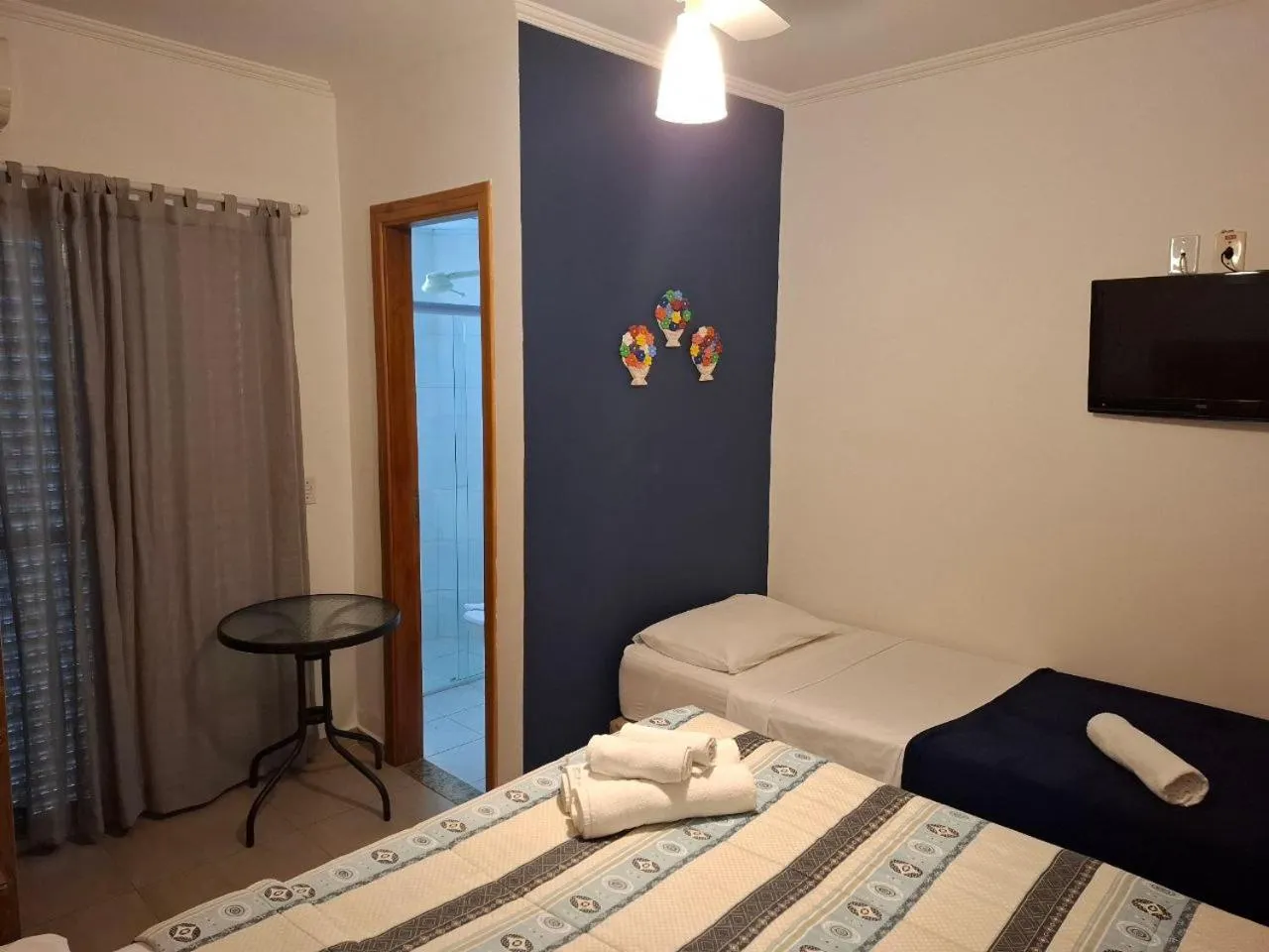 Bed in Pousada Villa Virgínia Guarujá