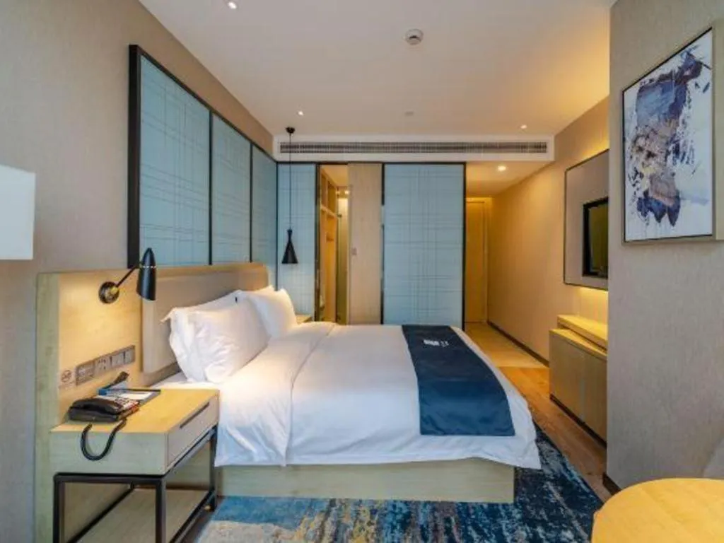 Bed in Echarm Hotel Hefei West Qilitang Metro Station