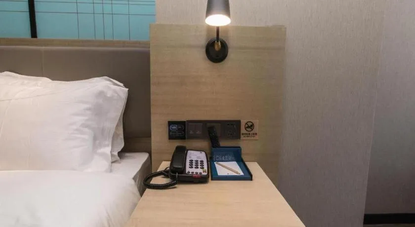 Bed in Echarm Hotel Hefei West Qilitang Metro Station