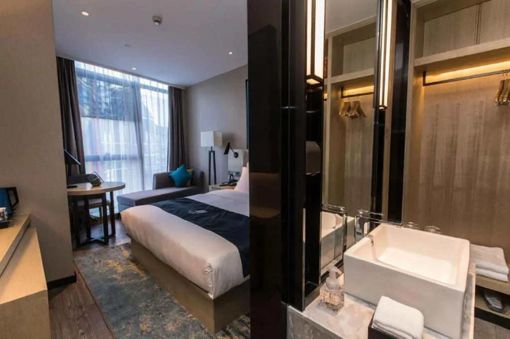 Bed in Echarm Hotel Hefei West Qilitang Metro Station