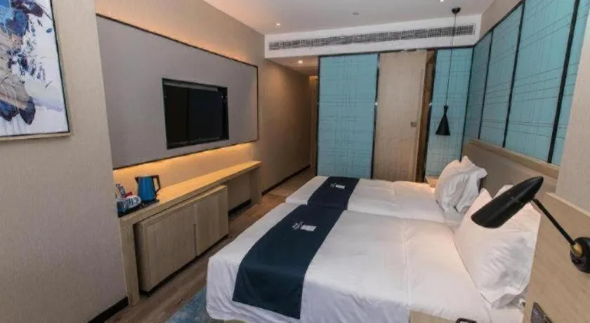 Bed in Echarm Hotel Hefei West Qilitang Metro Station