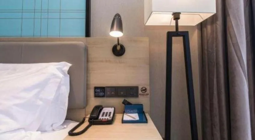 Bed in Echarm Hotel Hefei West Qilitang Metro Station