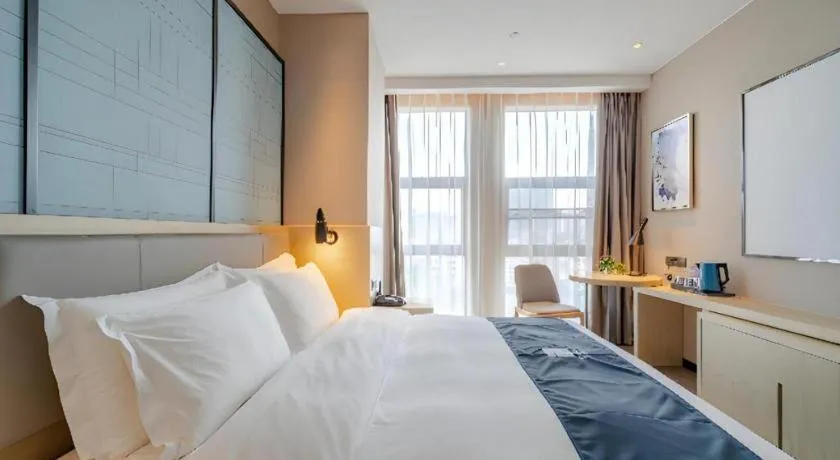 Bed in Echarm Hotel Hefei West Qilitang Metro Station