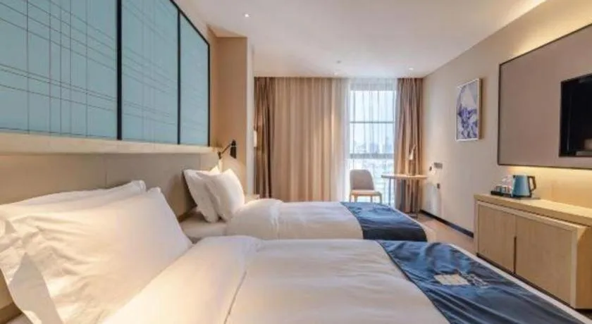 Bed in Echarm Hotel Hefei West Qilitang Metro Station