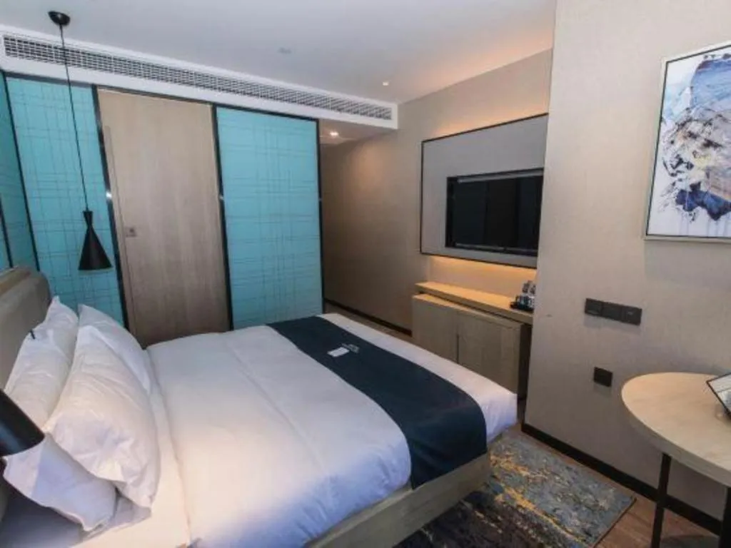 Bed in Echarm Hotel Hefei West Qilitang Metro Station