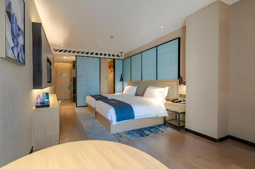 Bed in Echarm Hotel Hefei West Qilitang Metro Station