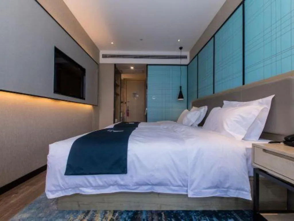 Bed in Echarm Hotel Hefei West Qilitang Metro Station