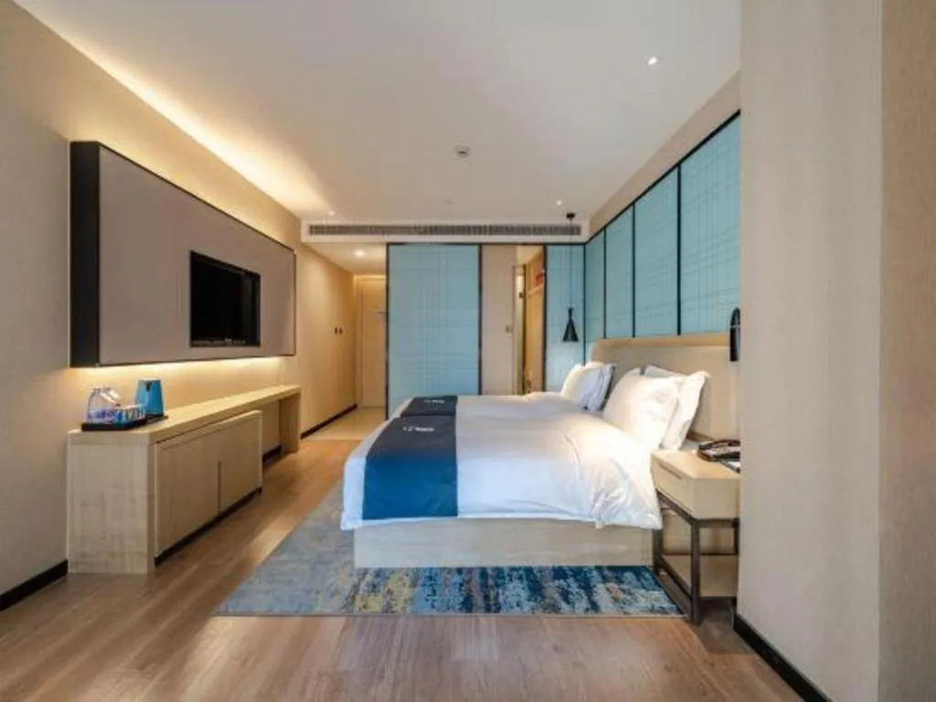 Bed in Echarm Hotel Hefei West Qilitang Metro Station