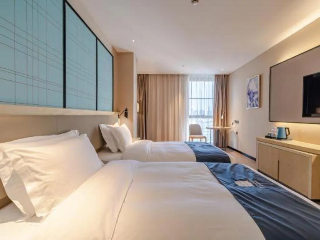 Bed in Echarm Hotel Hefei West Qilitang Metro Station