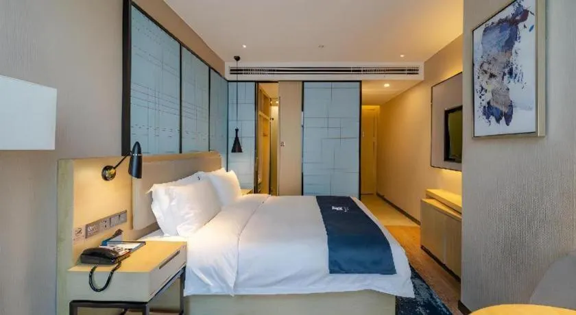 Bed in Echarm Hotel Hefei West Qilitang Metro Station