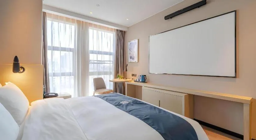 Bed in Echarm Hotel Hefei West Qilitang Metro Station