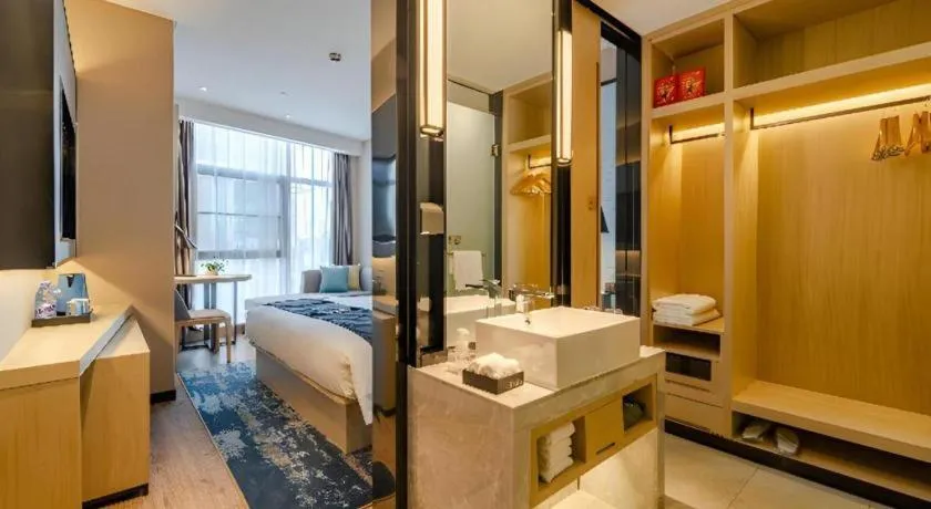 Bed in Echarm Hotel Hefei West Qilitang Metro Station