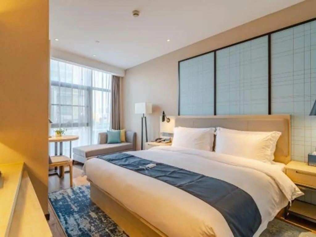 Bed in Echarm Hotel Hefei West Qilitang Metro Station