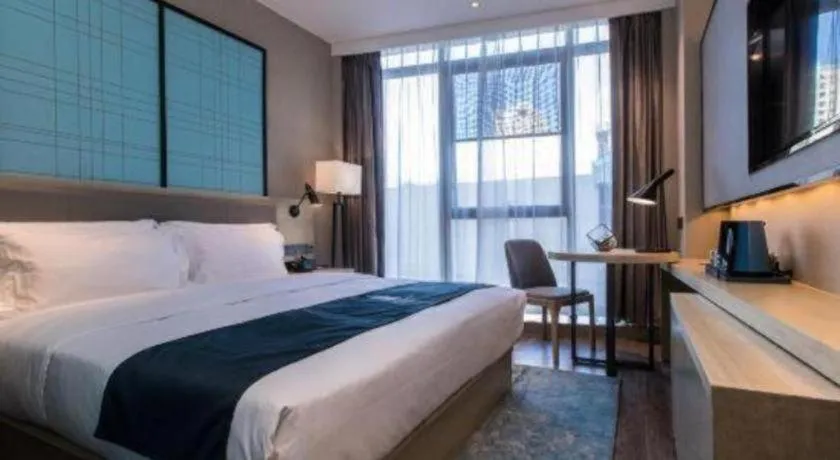 Bed in Echarm Hotel Hefei West Qilitang Metro Station