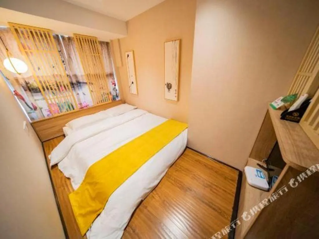 Bed in Echarm Hotel Hefei West Qilitang Metro Station