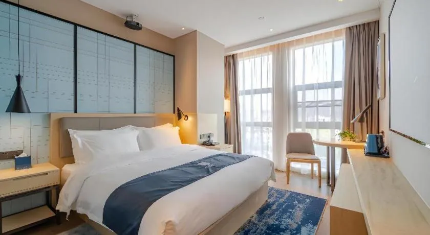 Bed in Echarm Hotel Hefei West Qilitang Metro Station