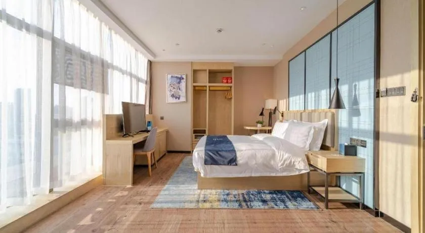 Bed in Echarm Hotel Hefei West Qilitang Metro Station