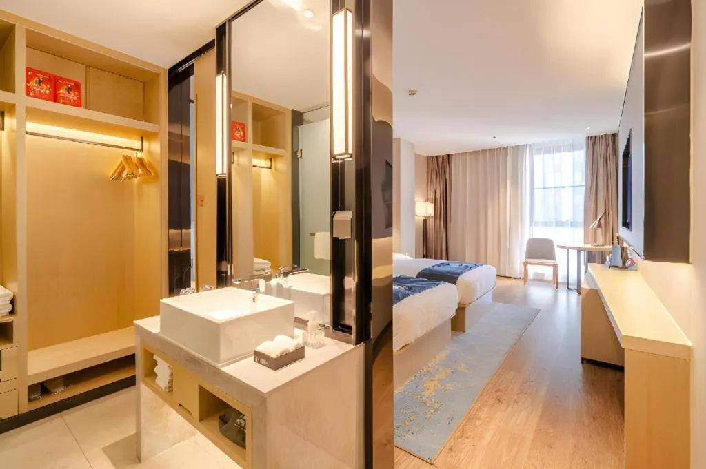 Bed in Echarm Hotel Hefei West Qilitang Metro Station