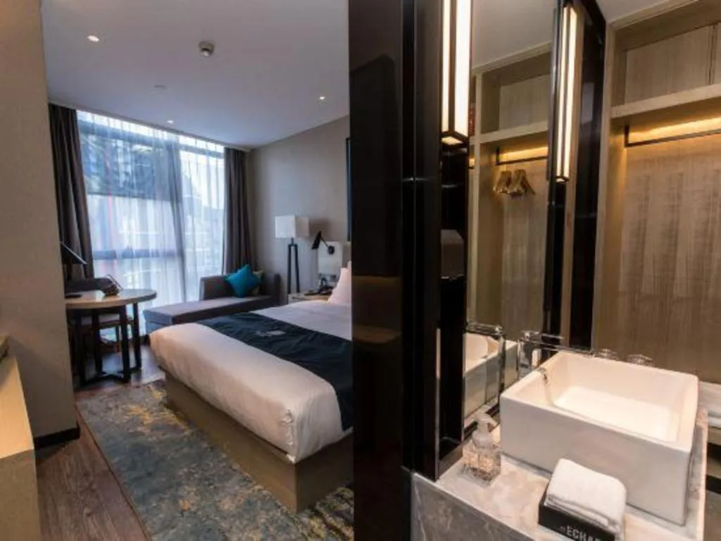 Bed in Echarm Hotel Hefei West Qilitang Metro Station