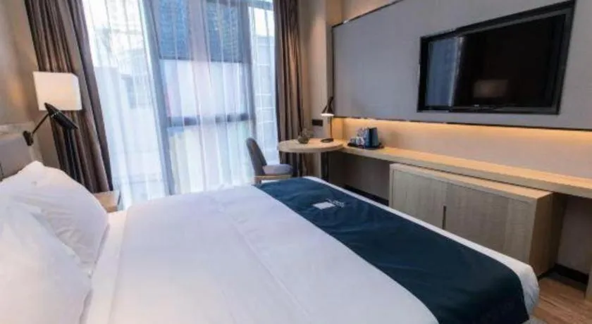 Bed in Echarm Hotel Hefei West Qilitang Metro Station