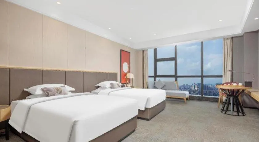 Bed in E-Cheng Hotel Yangjiang Baili Plaza