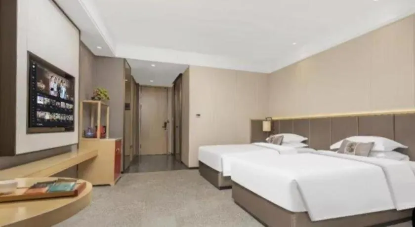 Bed in E-Cheng Hotel Yangjiang Baili Plaza
