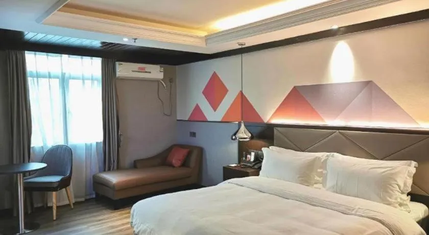 Bed in Borrman Hotel Zhongshan Henglan Xiyong