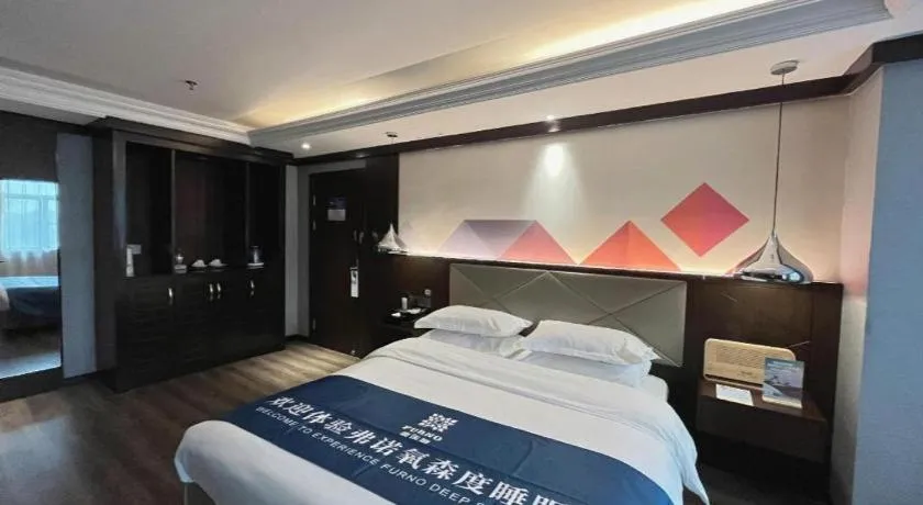 Bed in Borrman Hotel Zhongshan Henglan Xiyong