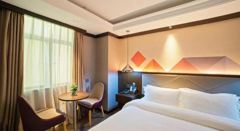 Bed in Borrman Hotel Zhongshan Henglan Xiyong