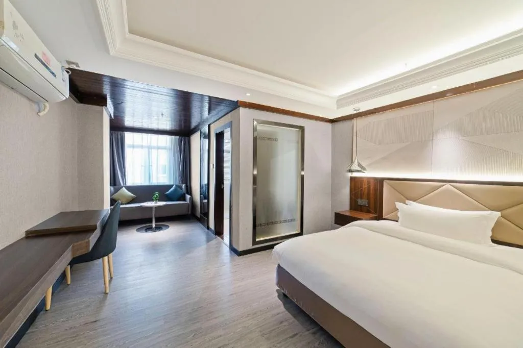 Bed in Borrman Hotel Zhongshan Henglan Xiyong