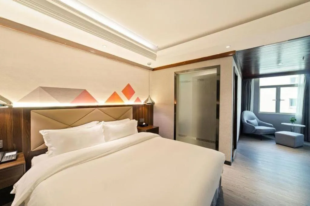 Bed in Borrman Hotel Zhongshan Henglan Xiyong