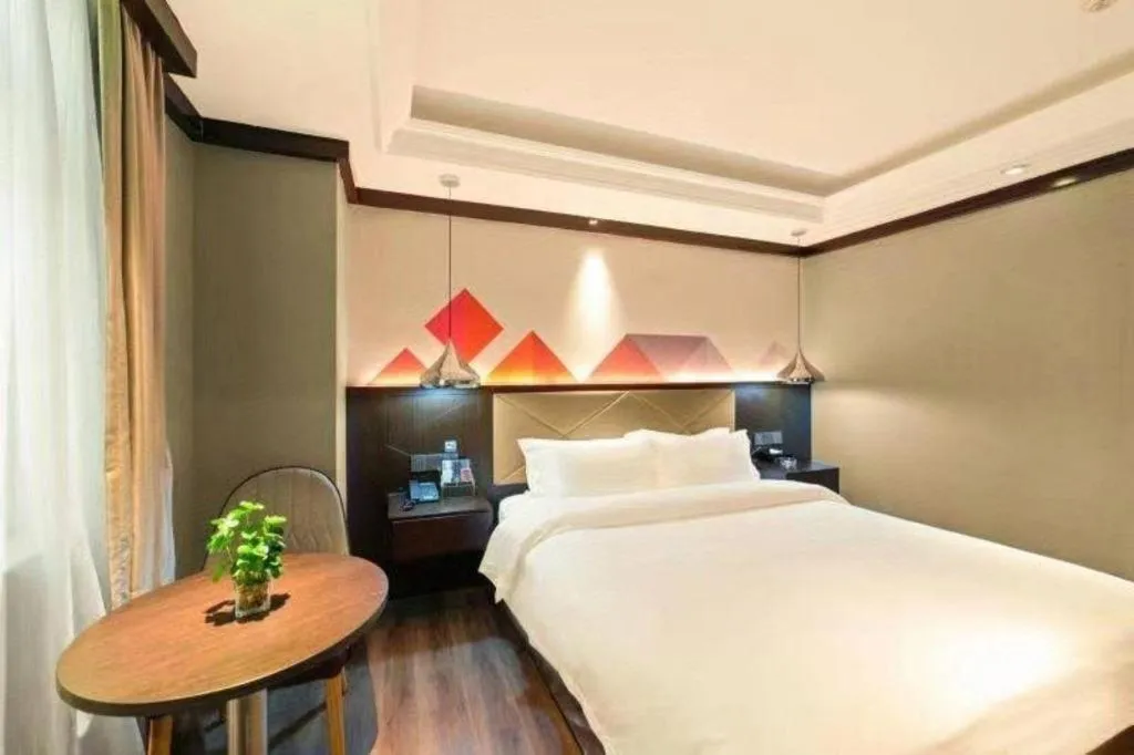 Bed in Borrman Hotel Zhongshan Henglan Xiyong