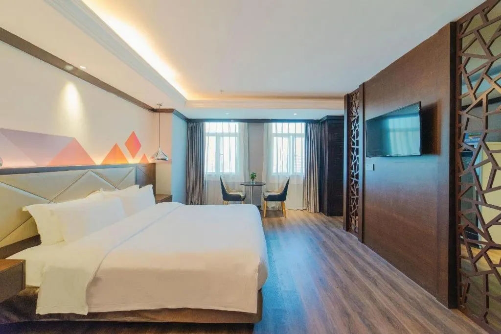 Bed in Borrman Hotel Zhongshan Henglan Xiyong