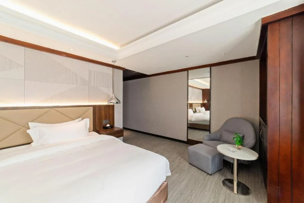 Bed in Borrman Hotel Zhongshan Henglan Xiyong