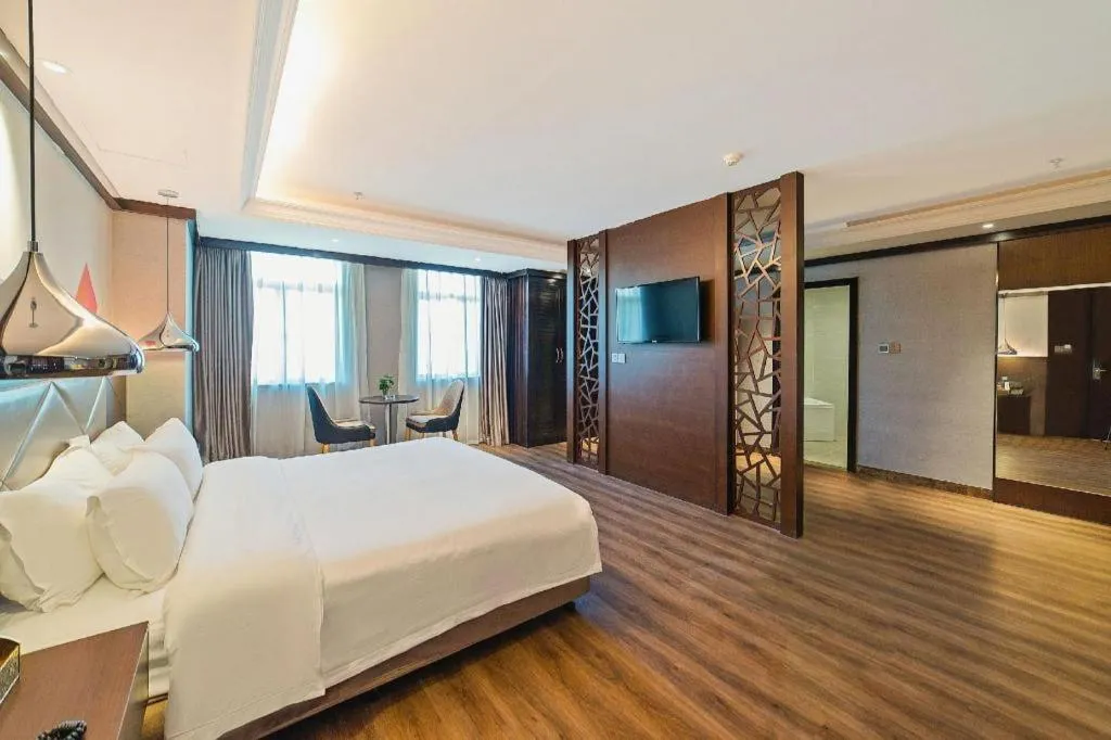 Bed in Borrman Hotel Zhongshan Henglan Xiyong