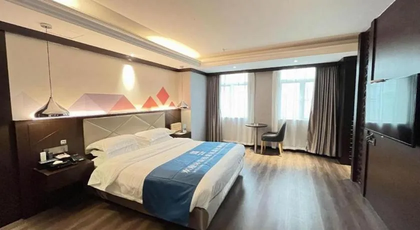 Bed in Borrman Hotel Zhongshan Henglan Xiyong