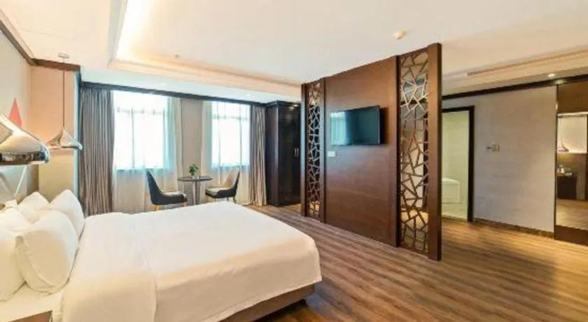 Bed in Borrman Hotel Zhongshan Henglan Xiyong