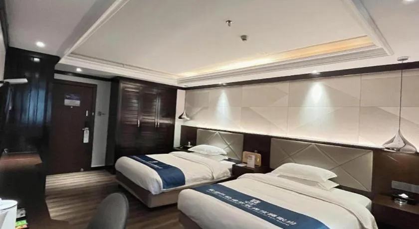 Bed in Borrman Hotel Zhongshan Henglan Xiyong