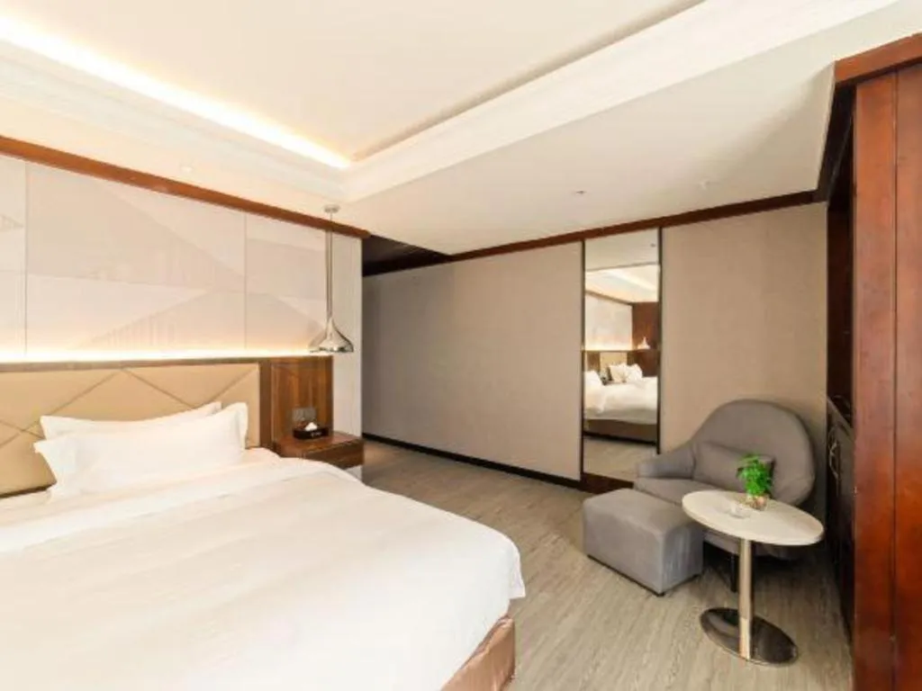 Bed in Borrman Hotel Zhongshan Henglan Xiyong