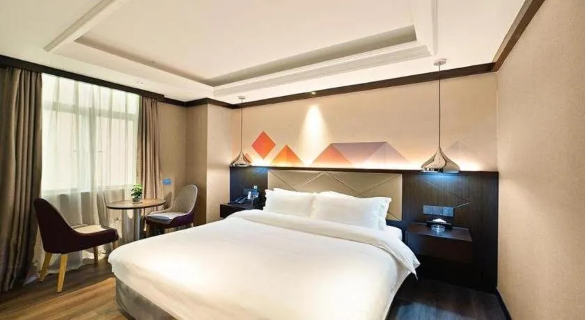 Bed in Borrman Hotel Zhongshan Henglan Xiyong