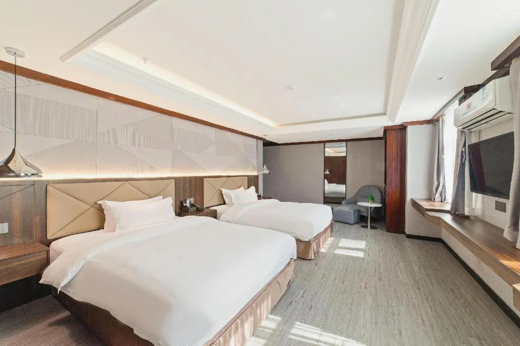 Bed in Borrman Hotel Zhongshan Henglan Xiyong