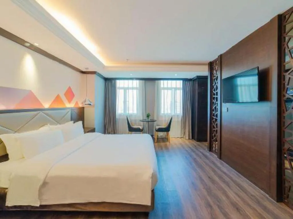 Bed in Borrman Hotel Zhongshan Henglan Xiyong